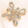 Rotary Gold Swirl w/ Clear Crystals Pin