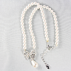 Rotary Pearl Necklace w/ Crystal Studded Bow